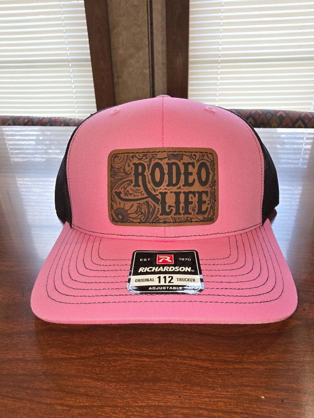 Richardson Pink/Black Adjustable Mesh Back Trucker Hat "Rodeo Life" Patch